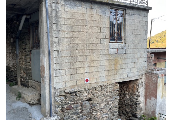 Συνέχεια παραδοσιακής τοιχοποιίας με τοιχοποιία από τσιμεντόλιθους